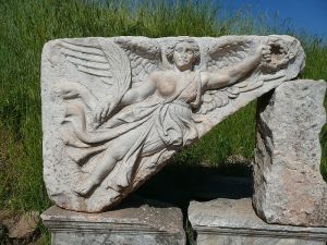 A stone carving of the Goddess Nike at the ruins of the ancient Greek city of Ephesus, Turkey 